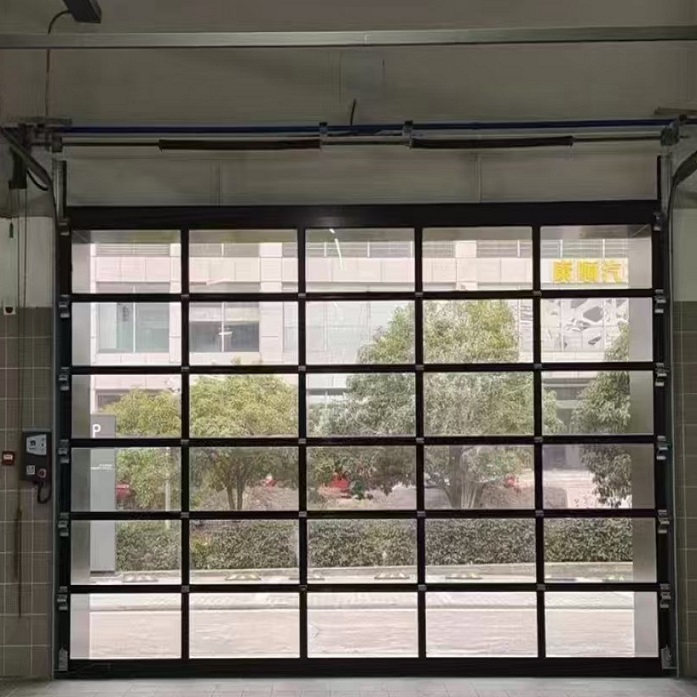Sectional glass garage door