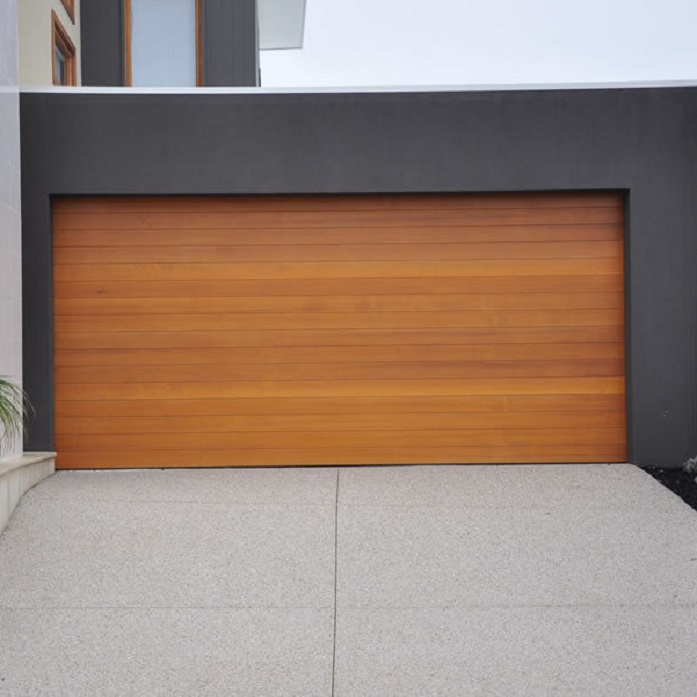 Wood panel sectional garage door