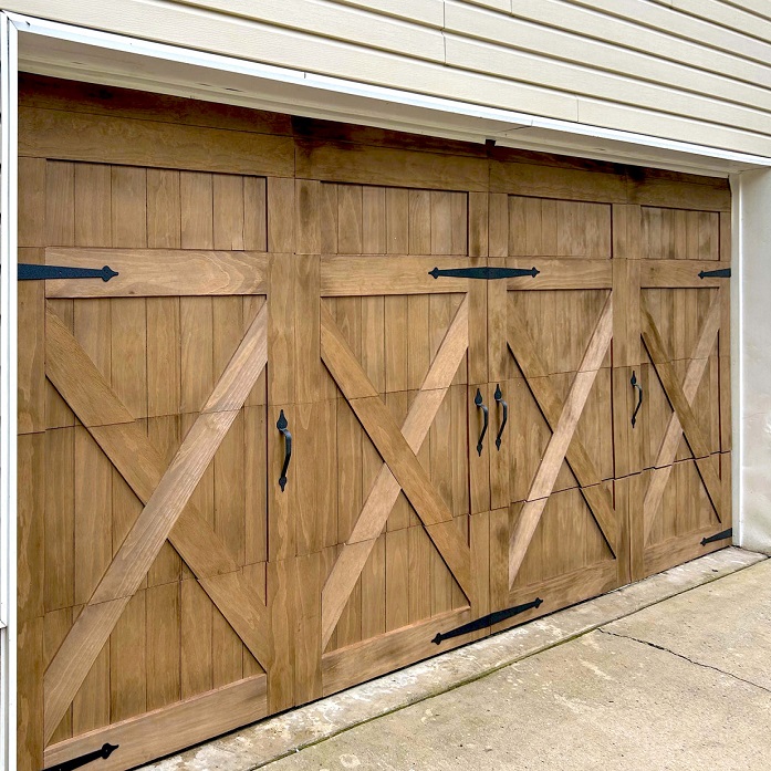 Wood panel sectional garage door